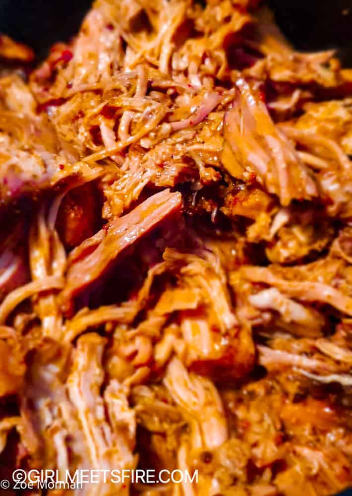 a closeup of the Cochinita all shredded and bathing in its juices