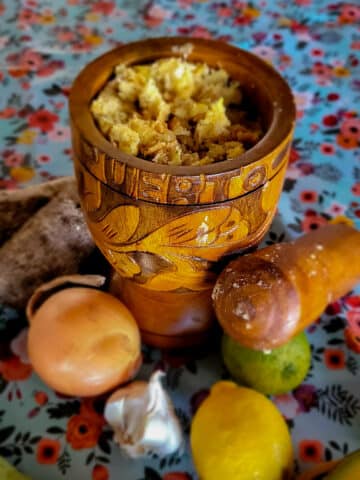 pestle and mortar filled with mofongo