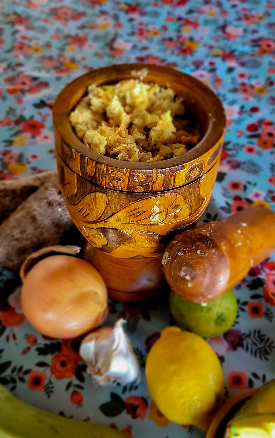 pestle and mortar filled with mofongo