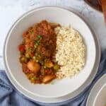 Pasta bowl with chicken chorizo stew and white rice.