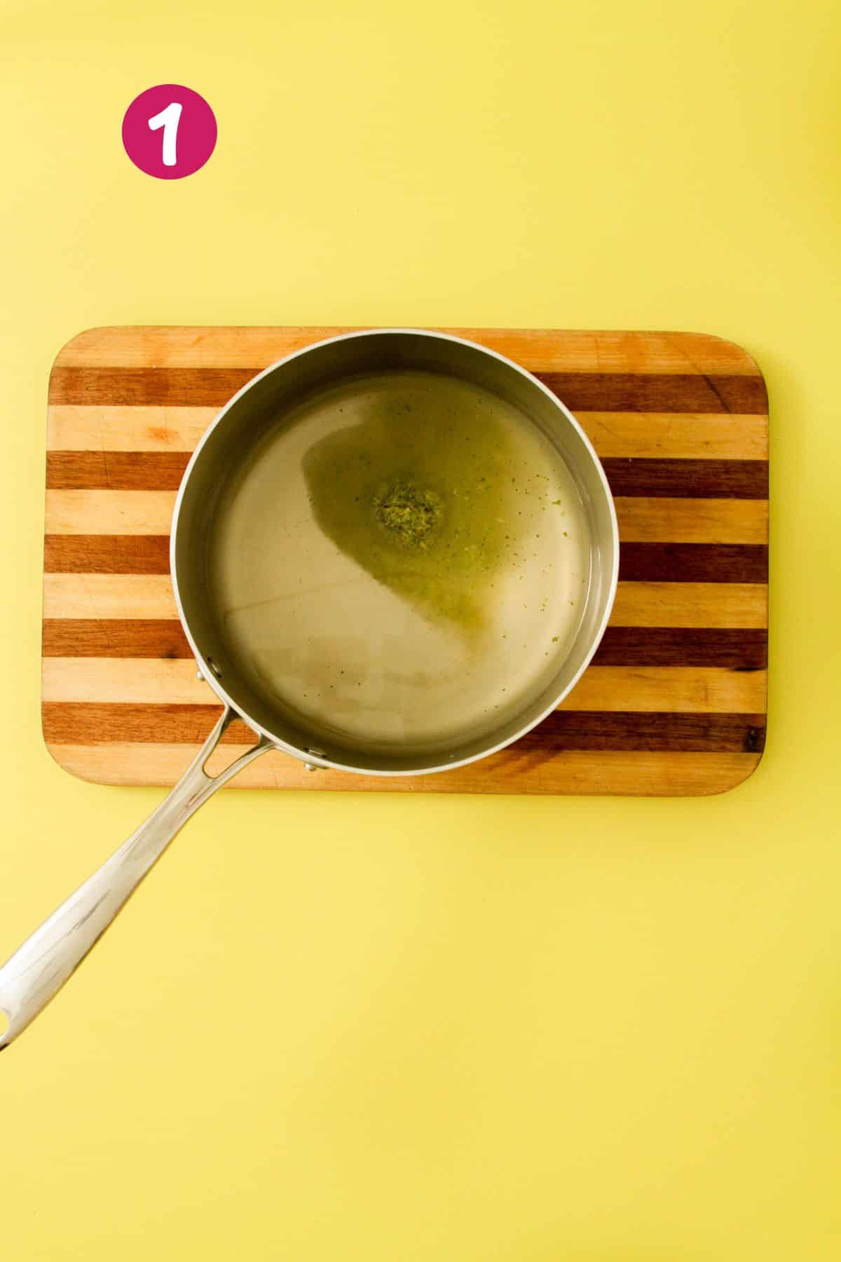 Pot with broth and sofrito.