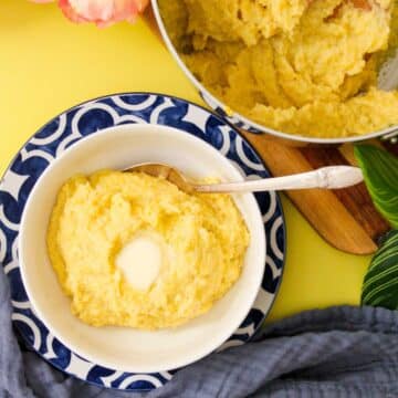 Funche in a white bowl with a dab of butter.