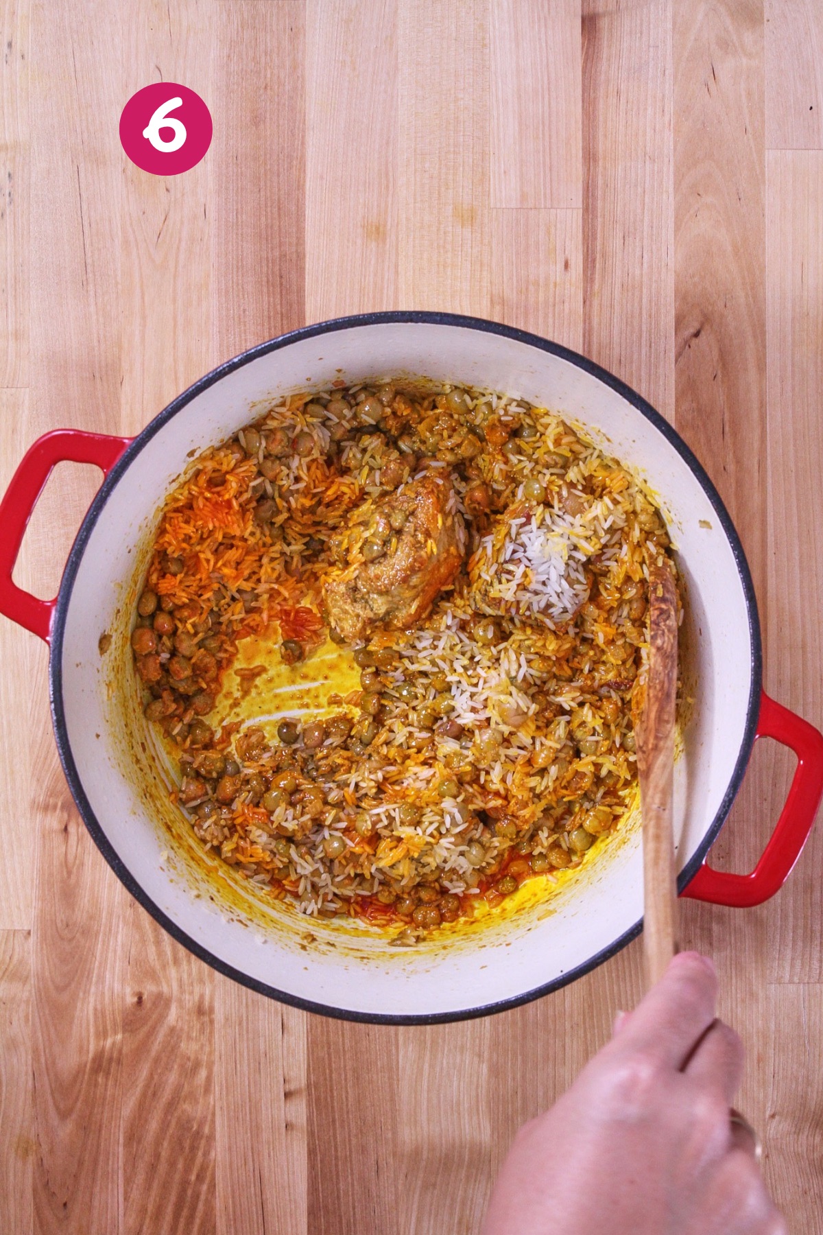 Rice gently stirred and coated with achiote oil.