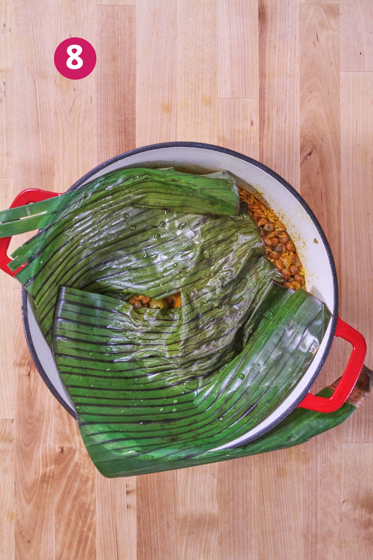 Banana leaves placed over the rice while it finishes cooking.