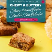 Peanut butter chocolate chip blondie squares on a yellow surface with a teal Pinterest-style overlay graphic reading "Chewy and Buttery Classic Peanut Butter Chocolate Chip Blondies" and girlmeetsfire.com.